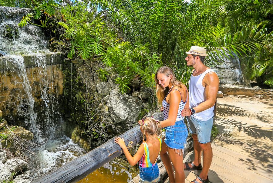 Family at the waterfall on Chankanaab’s pre-Hispanic interpretive walk
